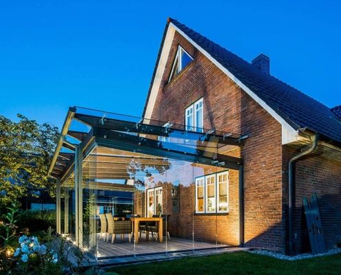 terraza con cortinas de cristal